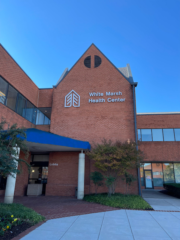Outdoor shot of the White Marsh Towncenter lobby where honeygo pediatrics is located