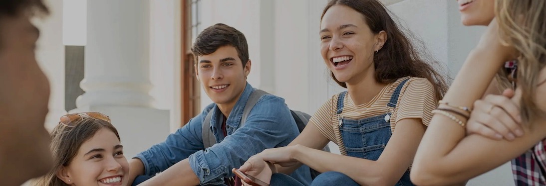 A group of young adolescents having a conversation